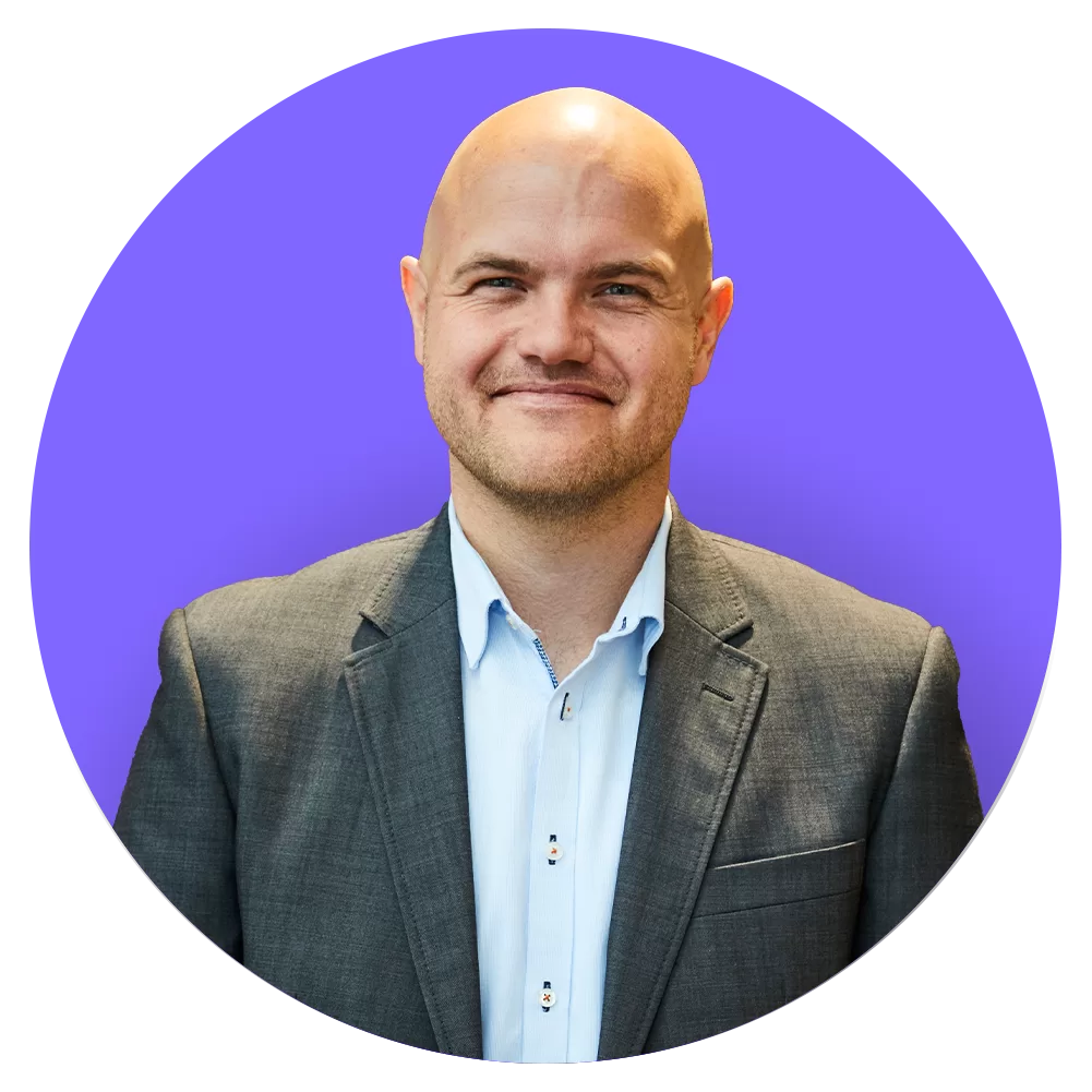 Headshot of Brian Dørffler Heilskov with purple background