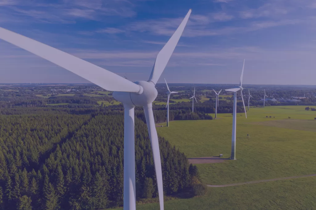 Wind and energy output optimization in Germany with wind turbines in the background